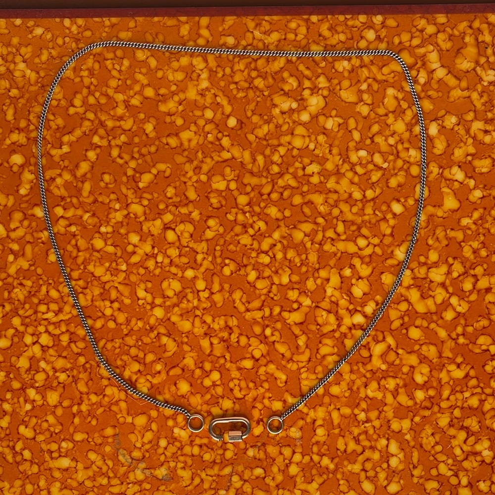 Marla Aaron baby lock and chain